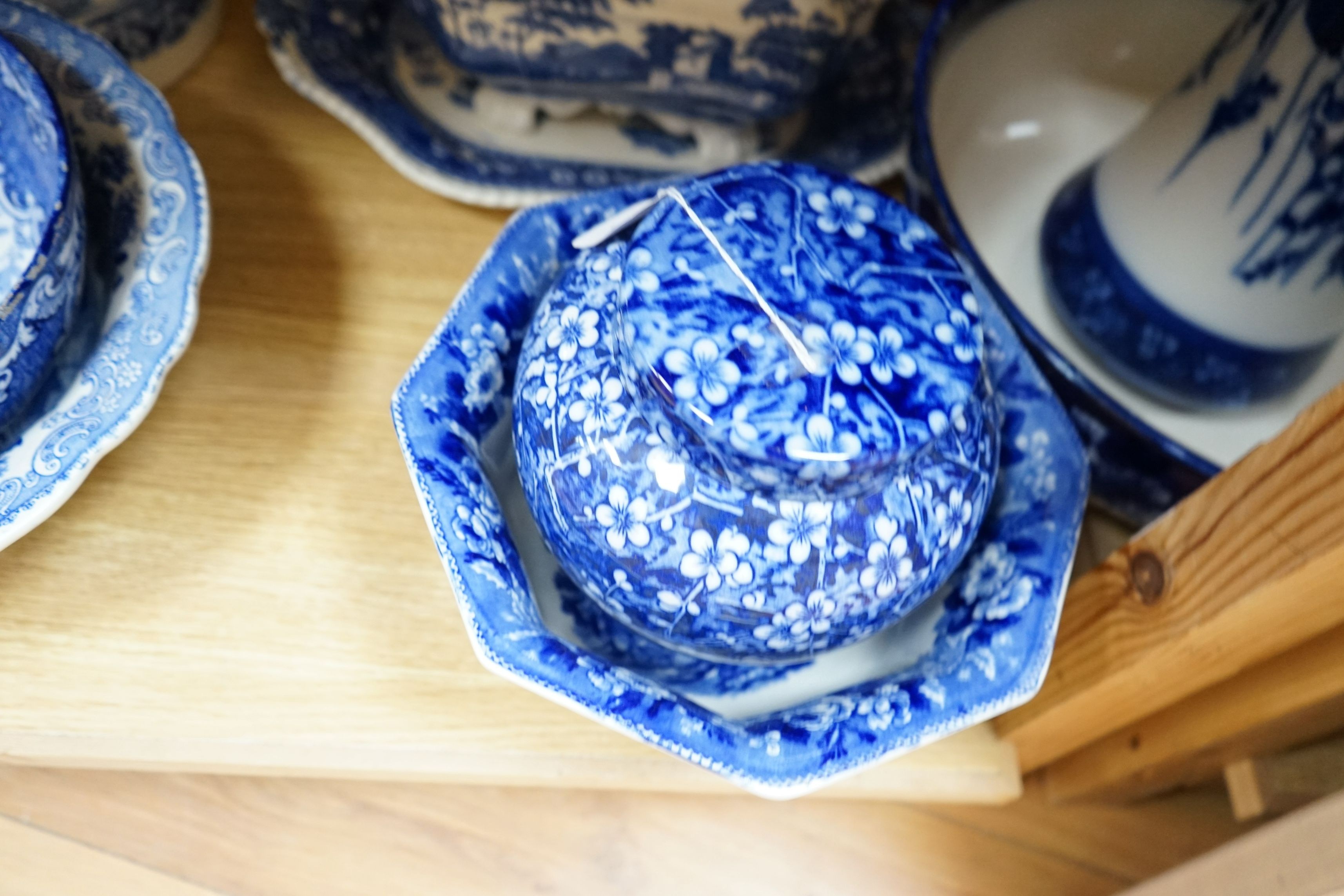 A blue and white jug and basin, tureen, cover and stand, slop pail, a jar and cover and three bowls